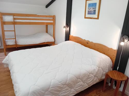 Ένα ή περισσότερα κρεβάτια σε δωμάτιο στο Terrasses E 405 - PARC NAT VANOISE appart 8 pers