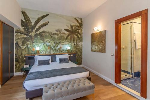 En eller flere senge i et værelse på Hotel Accademia