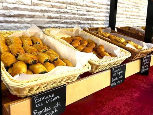 a display of different types of pastries in baskets at Park Hotel Moskva in Sofia