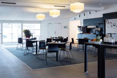 Restaurant ou autre lieu de restauration dans l'établissement Scandic Aalborg Øst