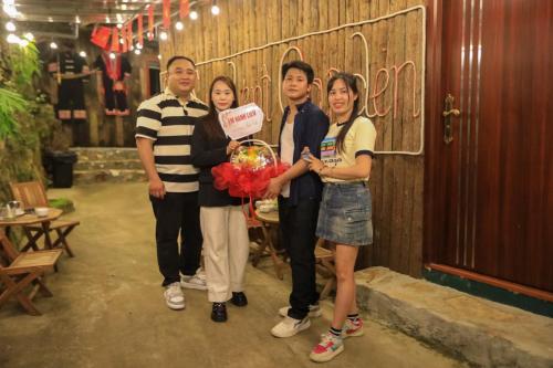 a group of people holding a bouquet of flowers at Sapa Succulent Garden Homestay in Sa Pa