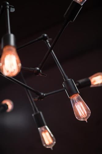 a group of lights hanging from a ceiling at Xinshe Hotel - Hsinchu in Hsinchu City