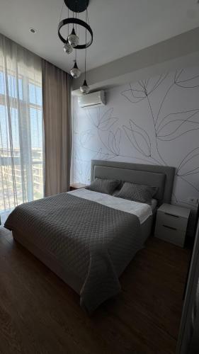 Llit o llits en una habitació de Caspianseabreeze