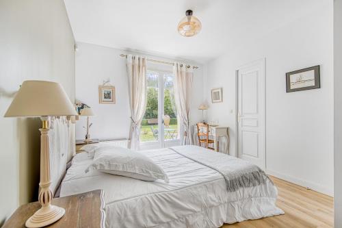 Una cama o camas en una habitación de Bastide De Mongiraud