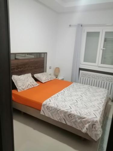 Postel nebo postele na pokoji v ubytování Dar Othman