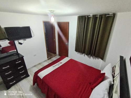 Una cama o camas en una habitación de Hotel D'Gloria Churin
