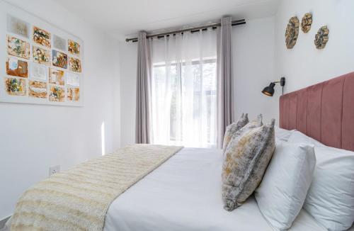 Ένα ή περισσότερα κρεβάτια σε δωμάτιο στο Willow House Oasis - Your Haven