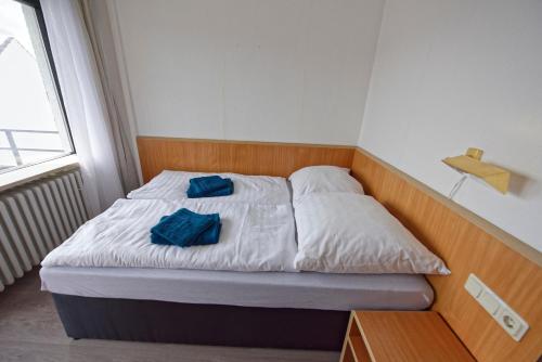Ein Bett oder Betten in einem Zimmer der Unterkunft Room4You - Bad Hersfeld