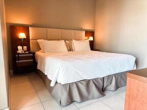 Postel nebo postele na pokoji v ubytování Hotel Cianorte Diamond
