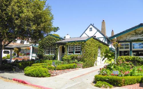 a house with ivy growing on the side of it at Briarwood Inn in Carmel