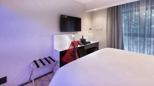 TV a/nebo společenská místnost v ubytování ANEW Hotel Green Point Cape Town