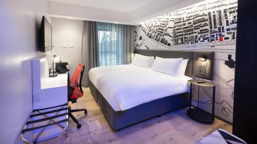 Postel nebo postele na pokoji v ubytování ANEW Hotel Green Point Cape Town