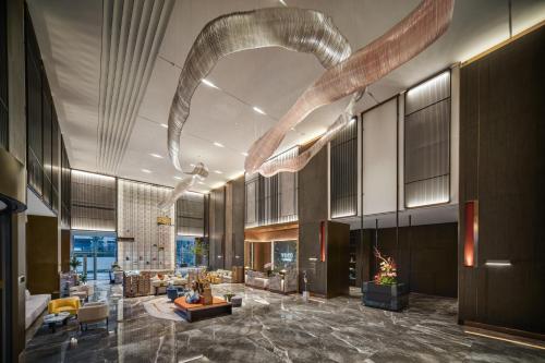 Posezení v ubytování 成都九眼桥voco 酒店- voco Chengdu Jiuyanqiao
