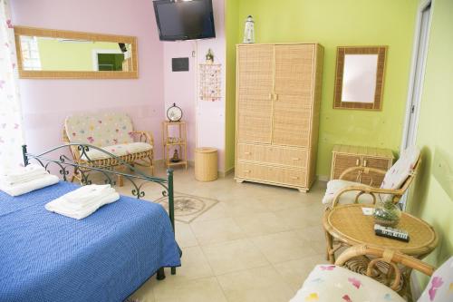 Ένα ή περισσότερα κρεβάτια σε δωμάτιο στο B&B Sunshine