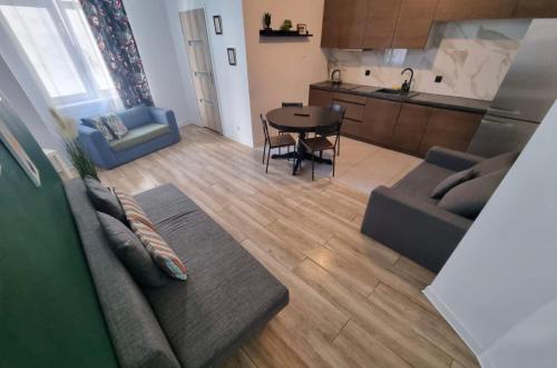 Nhà bếp/bếp nhỏ tại Strefa Mariacka - D a m r o t a Residence