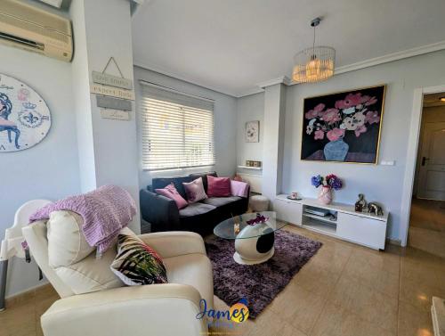 a living room with a couch and a table at Los Dolses Family Villa with Private Pool LD07 in Los Dolses