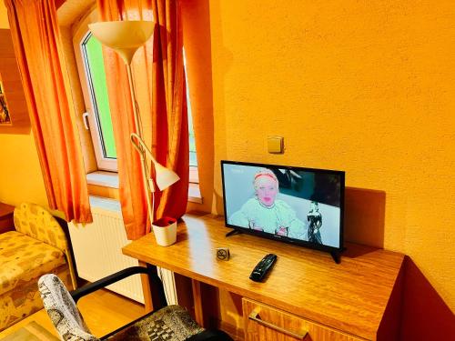 TV a/nebo společenská místnost v ubytování Penzión Tyché
