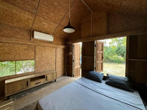 Postel nebo postele na pokoji v ubytování Homie Hava Homestay