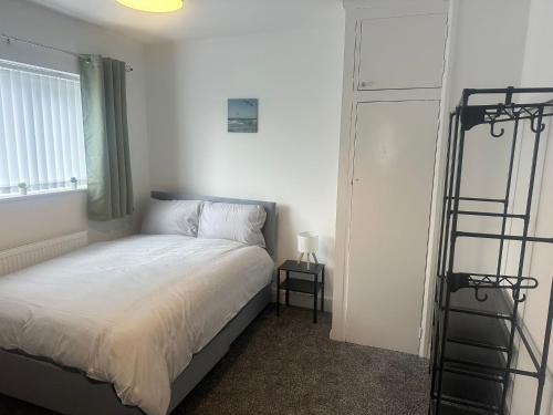 Ένα ή περισσότερα κρεβάτια σε δωμάτιο στο Lightfoot Lodge TSAC