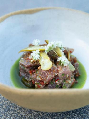 a bowl of food with meat and vegetables at Sifnos Blue Horizon House - Endless Blue in Apollonia