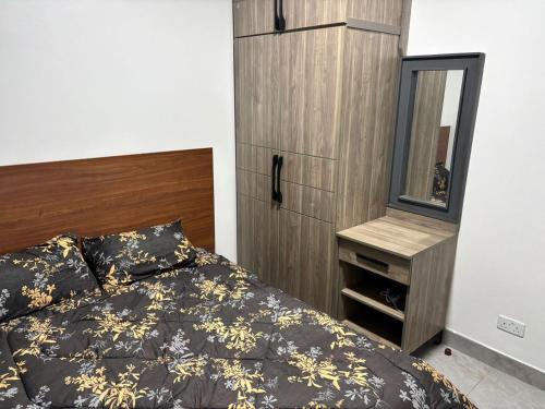 Katil atau katil-katil dalam bilik di CALM STAYs 1 BHK