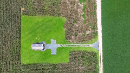 an overhead view of a field with a cross in it at Charming 2BR with Fire Pit on Farm - 10 Min to Wharf in Onancock