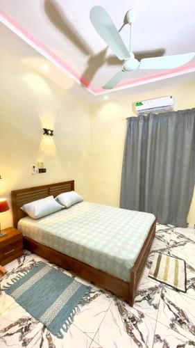Giường trong phòng chung tại Your Comfort