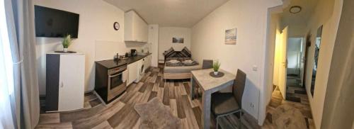 Η κουζίνα ή μικρή κουζίνα στο M&BLuxux Apartments