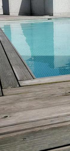 Estudio con piscina comunitaria