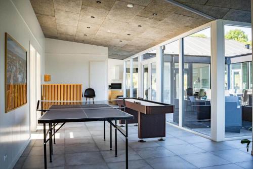 a room with two ping pong tables in it at 8567-Grenaa-Sletten-106 in Fuglsang