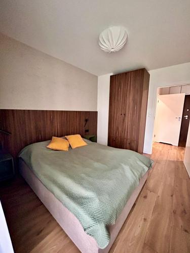 Ένα ή περισσότερα κρεβάτια σε δωμάτιο στο Apartament Targowa