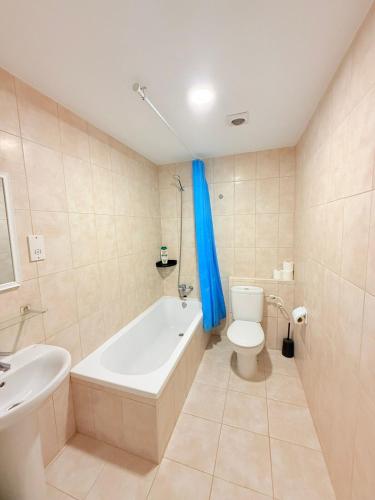 Koupelna v ubytování Centre Town Modern Apartment