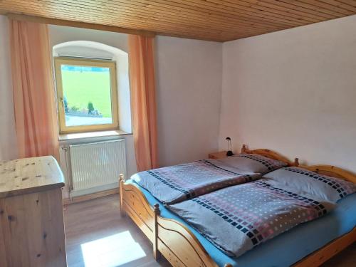 Una cama o camas en una habitación de Ruhe und Entspannung