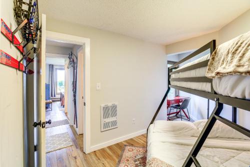 a bedroom with two bunk beds and a hallway at 1 Mi to Slopes! Sugar Mountain Retreat with Views in Sugar Mountain