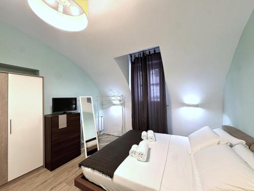 Ένα ή περισσότερα κρεβάτια σε δωμάτιο στο La fonte dell' 8-private parking