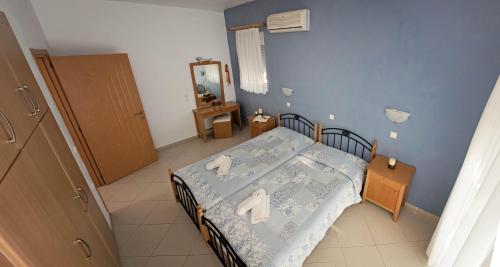 Nephele Apartmentsにあるベッド