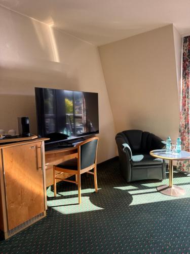 Μια τηλεόραση ή/και κέντρο ψυχαγωγίας στο Apartmenthaus Wilder Mann