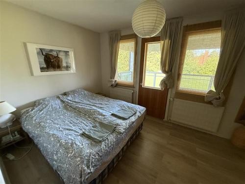 Кровать или кровати в номере Villa Edengård, next to Lohja lake