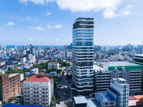 a view of a city with a tall building at TRIMULIA Hotel in Sihanoukville