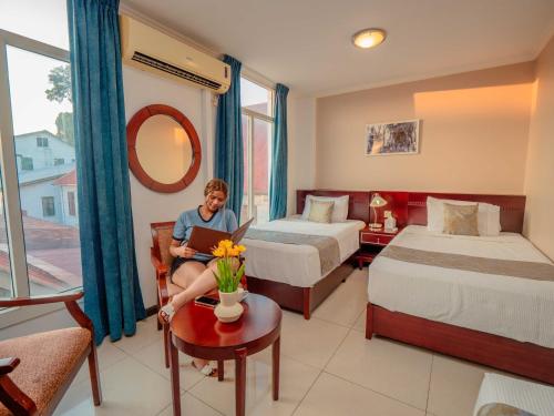 Postel nebo postele na pokoji v ubytování Hotel Palacio