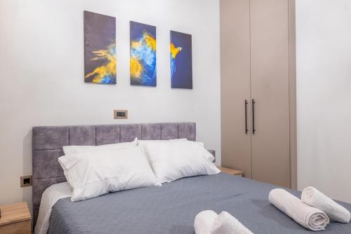 Postel nebo postele na pokoji v ubytování Corner Apartment