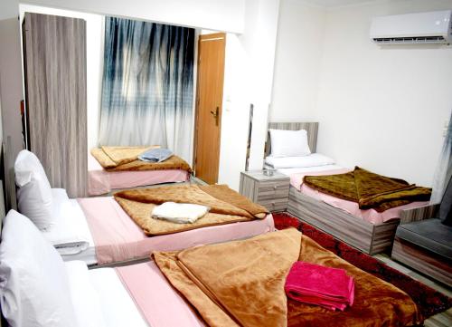 Cama o camas de una habitación en فندق أجياد Agyad Hotel
