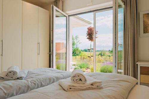 Ένα ή περισσότερα κρεβάτια σε δωμάτιο στο Ferienhaus Lieblingsplatz