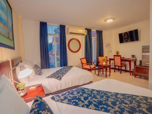 Postel nebo postele na pokoji v ubytování Hotel Palacio