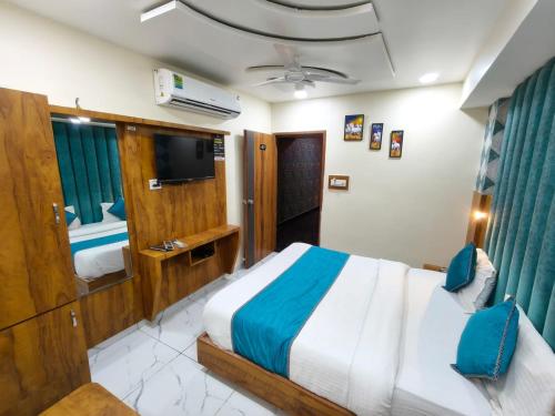 Una cama o camas en una habitación de Hotel Lemon Gota
