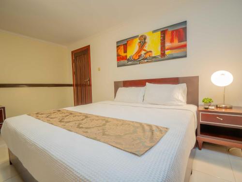 Postel nebo postele na pokoji v ubytování Hotel Palacio