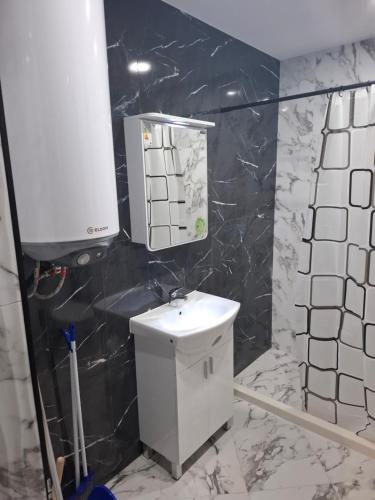 Koupelna v ubytování Апартамент Актив Спорт Гранд