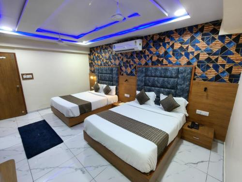 Una cama o camas en una habitación de Hotel Lemon Gota