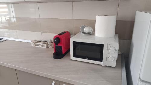 Η κουζίνα ή μικρή κουζίνα στο Stay Point Apartment