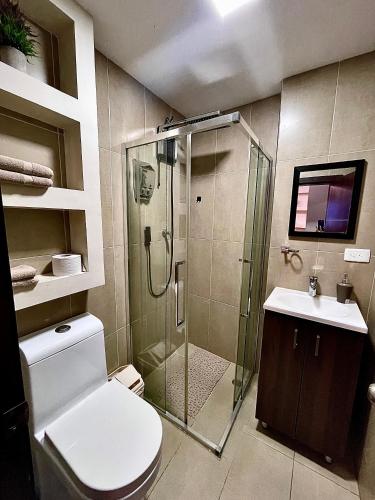Ένα μπάνιο στο Apartamento en Loja